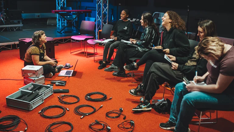 Group of young people in music training 