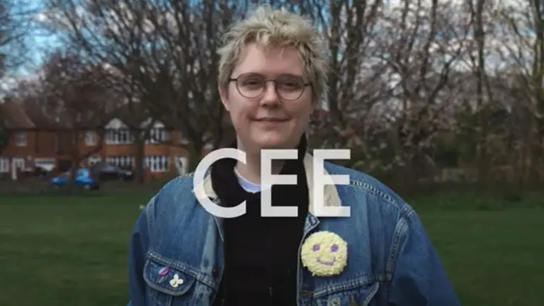 Cee Haines standing at a park looking at the camera