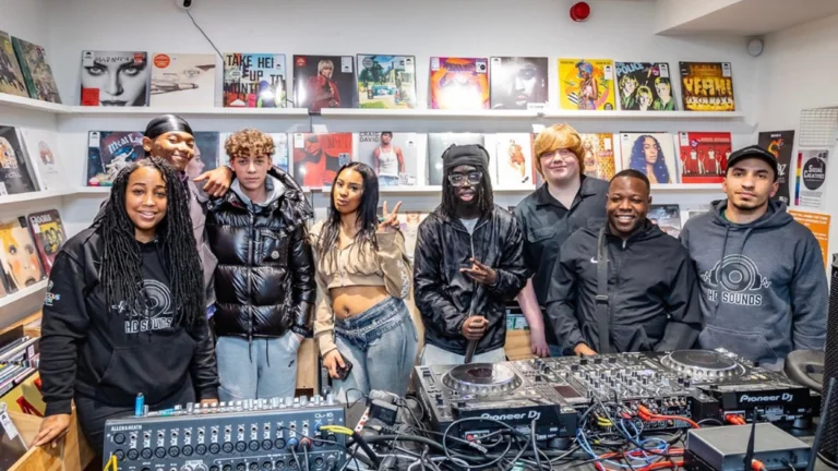 conscious youth team and participants in a record store