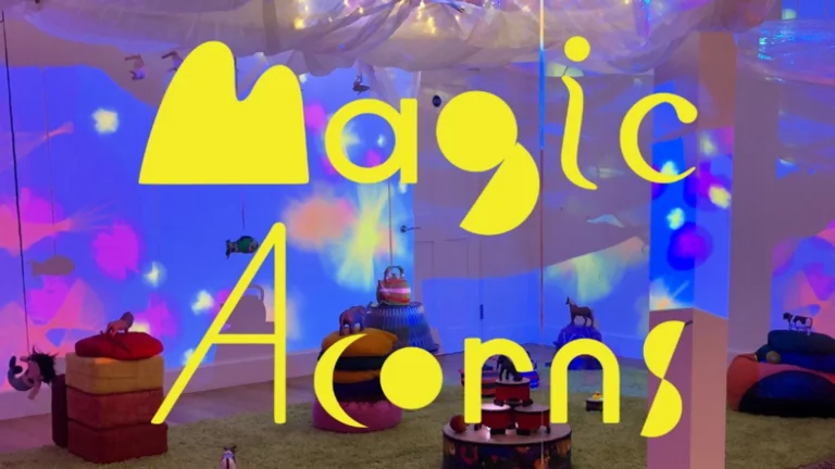 magic acorns logo over an image of their colourful immersive space