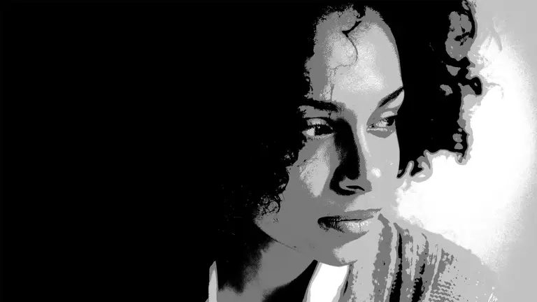 A black and white image of person's face looking to the right 