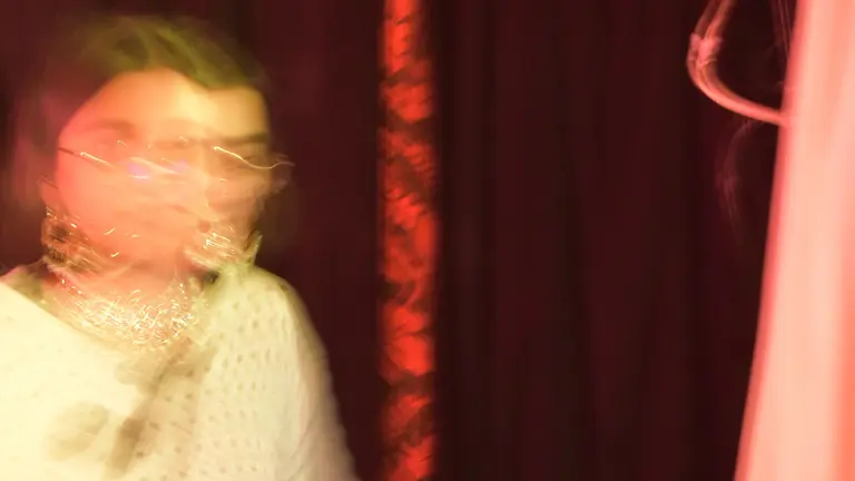 amina is blurred with a camera effect