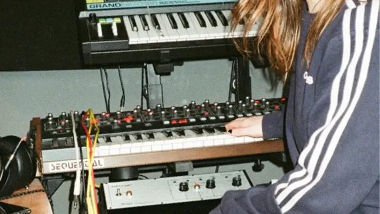 a person plays a keyboard