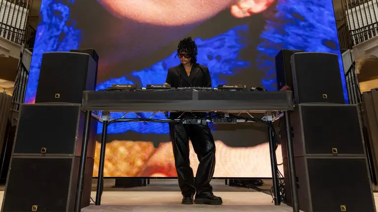 a person djs on a stage