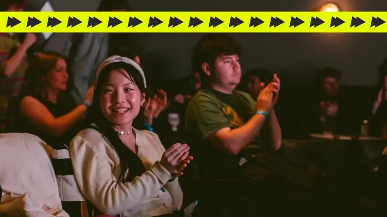 people clap while seated