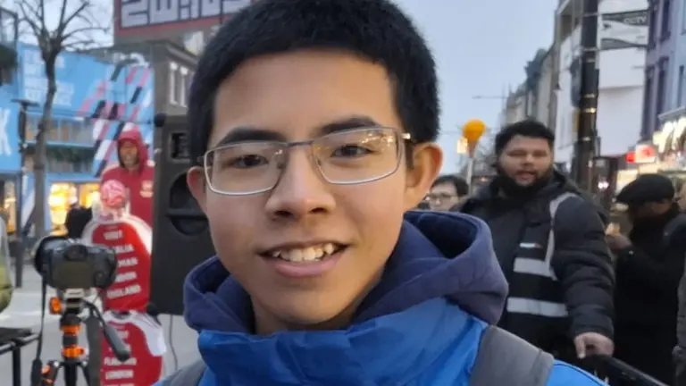 Heroic Dragon stood on a street looking at the camera 