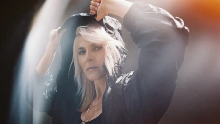 Sister bliss in a jacket with her hood up