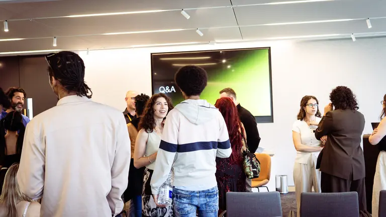 a room of people networking