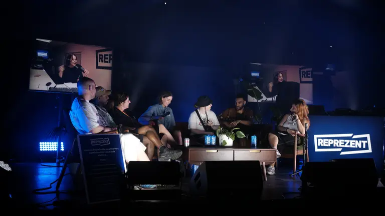 Six people in a dimly lit scenario 