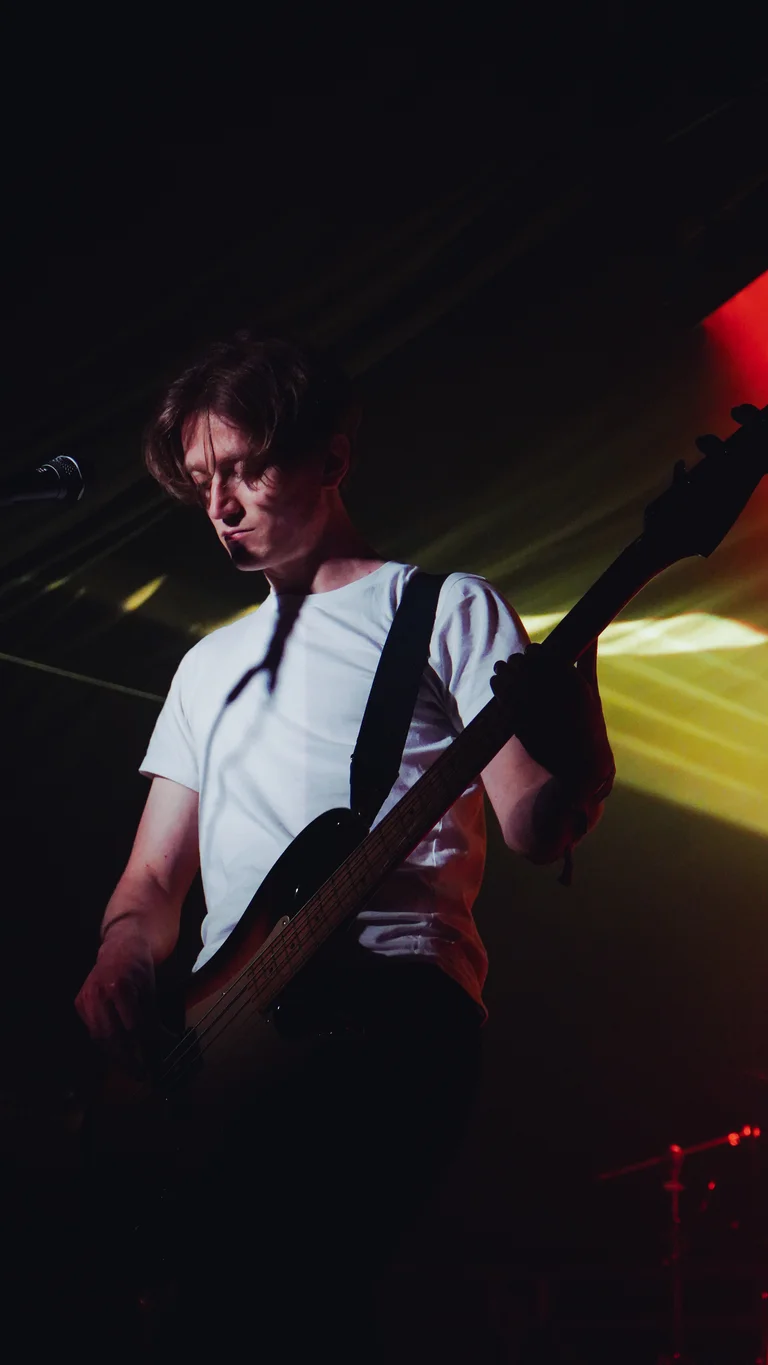 english teacher's lewis whiting plays the electric guitar