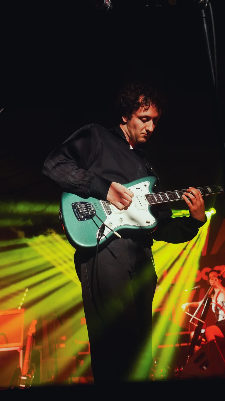 english teacher's nicholas eden plays the bass