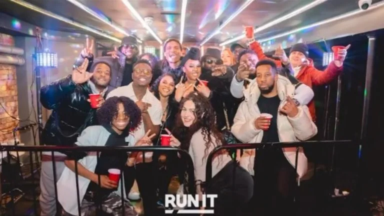 team from run it london posing for a group picture in the venue