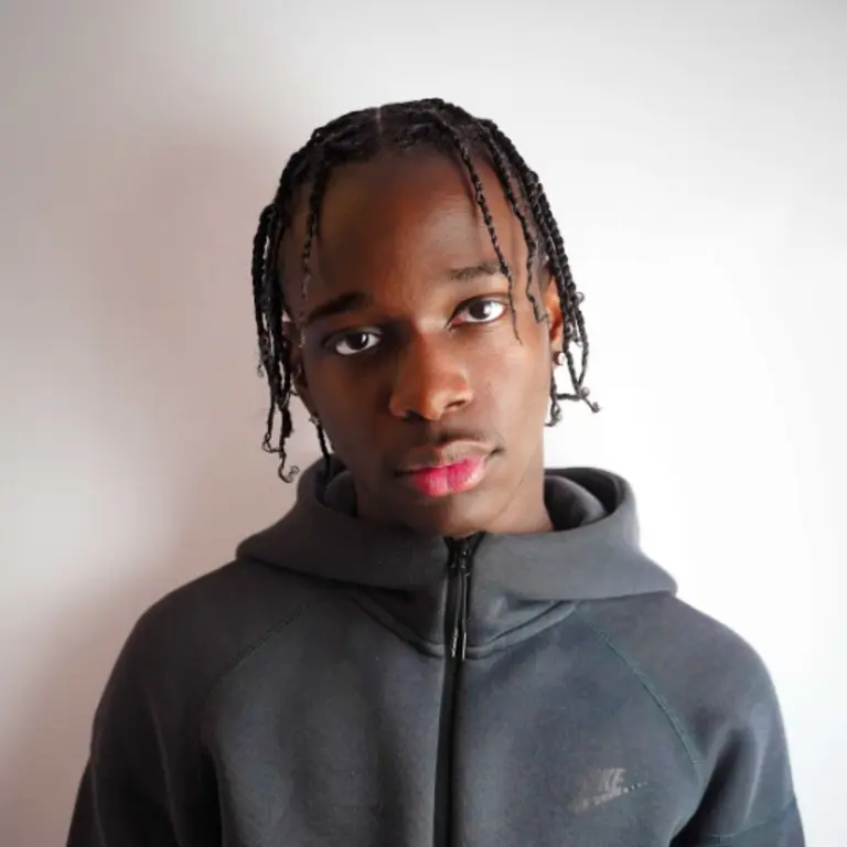 Kai Nero looking straight at the camera in a hoodie