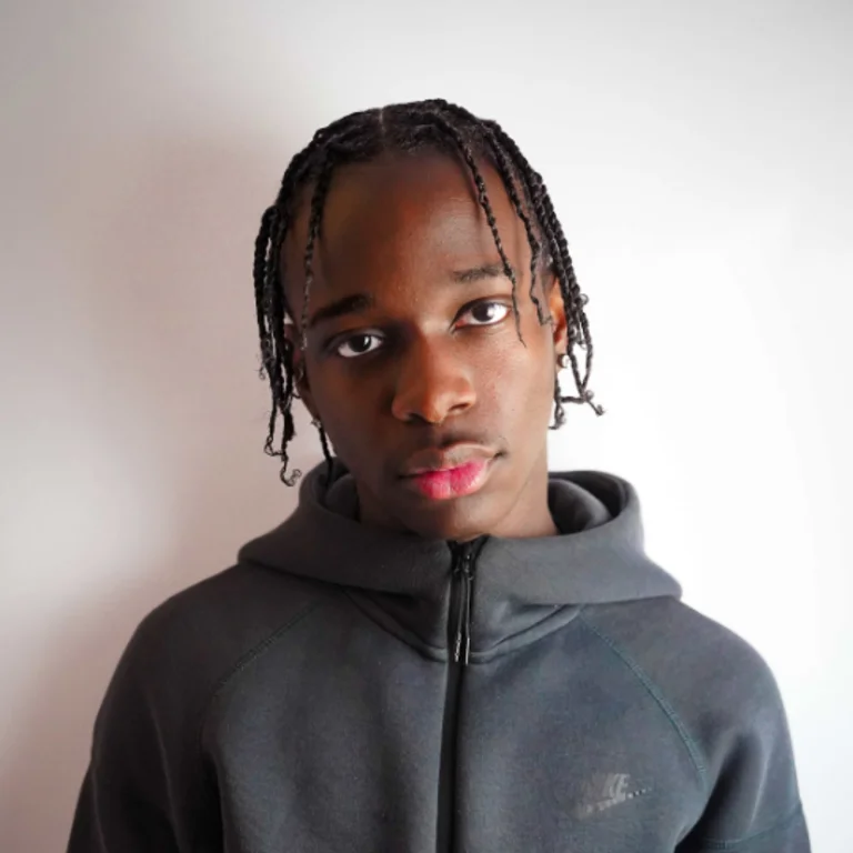 Kai Nero looking straight at the camera in a hoodie